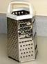 http://upload.wikimedia.org/wikipedia/commons/thumb/c/c1/Cheese_grater.jpg/88px-Cheese_grater.jpg