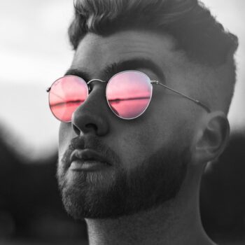 man with pink sunnies
